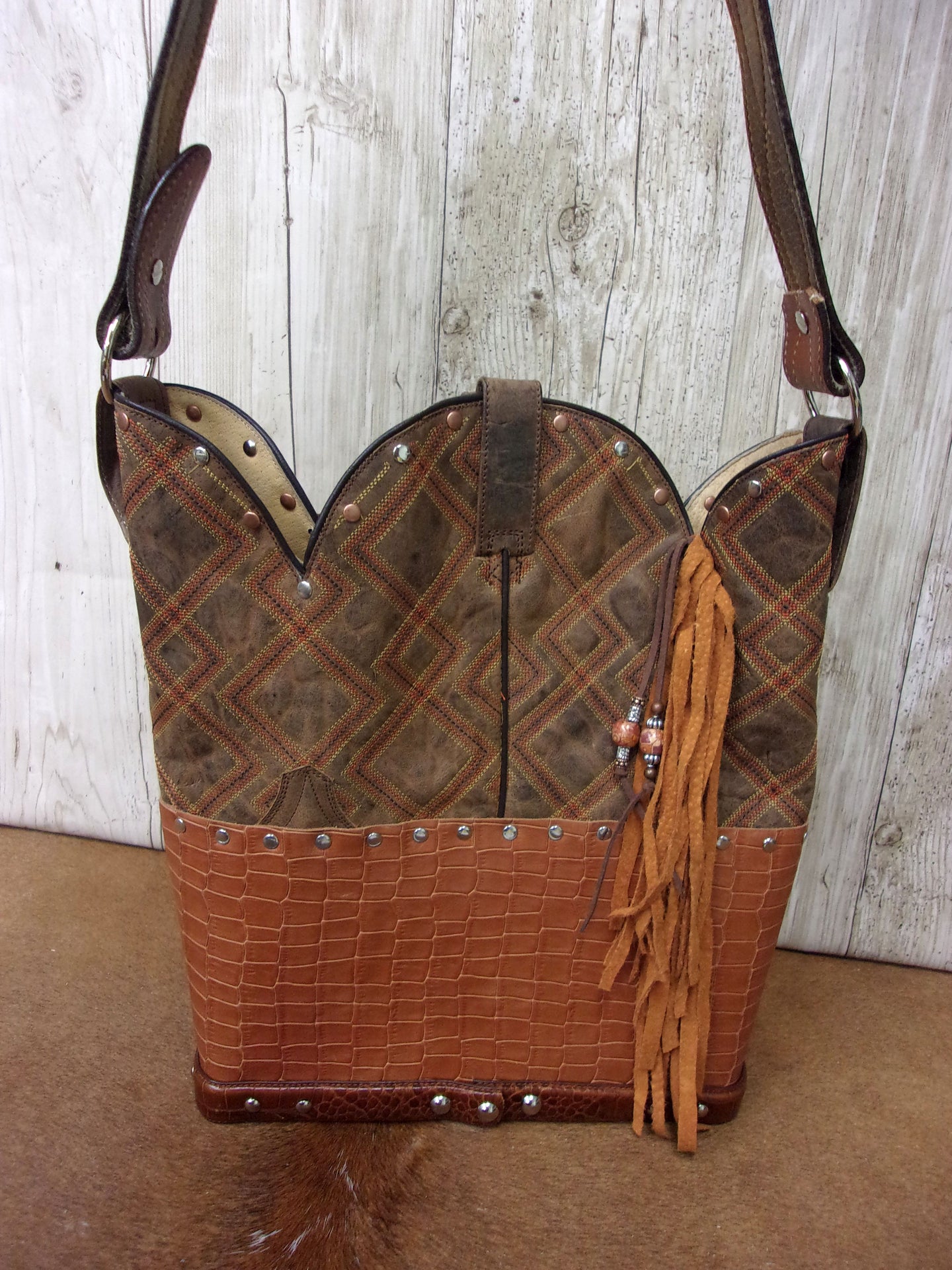 Top Shelf Cowboy Boot Purse with Fringe TS303 handcrafted from cowboy boots. Shop Handbags at ChrisThompsonBags.com and buy the best boot top purse, Country Chic, country fashion, country style, cowboy boot lover, cowboy boot purse, Cowgirl Chic, cowgirl style, luxury handbag, rodeo purse, western chic, western fashion, western style at Chris Thompson Bags.